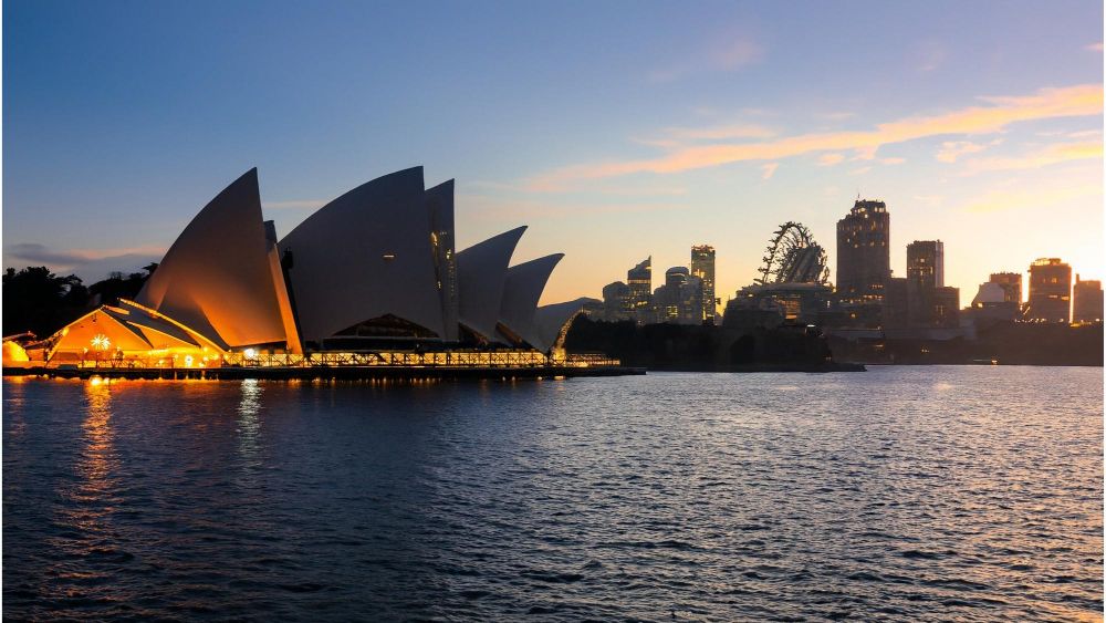 iconic-worlds-buildings-sydney-opera-house-with-sunset.jpg